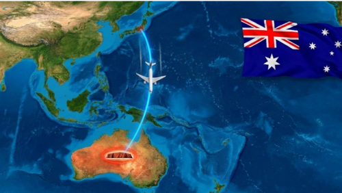 正確な地理的位置で描かれた世界地図、飛行機は日本→ウルル方向、ルート線がはっきり表示され、空いたスペースに大きなオーストラリア国旗