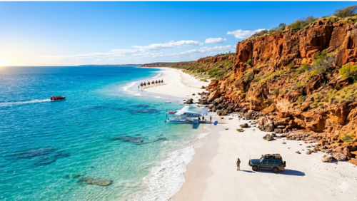 西オーストラリア州のケーブルビーチで、大自然の鮮やかな色彩が共演する壮大な風景写真です。

色彩のコントラスト： 画面右側にはキンバリー地域特有の荒々しい赤褐色の崖がそびえ立ち、その下にはどこまでも続く純白の砂浜、そして手前には透明度の高いターコイズブルーのインド洋が広がっています。

ビーチのアクティビティ：

砂浜の波打ち際付近には、白い水上飛行機（シープレーン）が停泊しており、その周りで人々が活動しています。

海上には赤い高速ジェットボートが白い航跡を描きながら進んでいます。

画面右下の砂浜には、オフロード仕様の暗緑色の4WD車が停車しており、その傍らにカウボーイハット（アクーブラ）を被った男性が立ち、海を眺めています。

遠景の象徴的な光景： 遠くの波打ち際では、沈みゆく太陽の光を浴びながら、ラクダの隊列（キャメル・トレイン）がゆっくりと砂浜を歩いており、ケーブルビーチを象徴するシルエットを作り出しています。

全体の雰囲気： 澄み切った青空の下、太陽の光が水面をキラキラと輝かせ、未開の自然と洗練されたリゾート感が融合した、開放感あふれる超高解像度画像です。