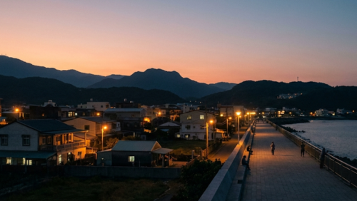夕暮れの台湾で、街の灯りと自然の風景が静かに溶け合う光景。何度でも訪れたくなる穏やかな旅の余韻を感じさせる風景