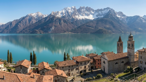 2026年冬季オリンピックで注目されるイタリアのアルプス、湖、歴史ある街並みを象徴する絶景風景